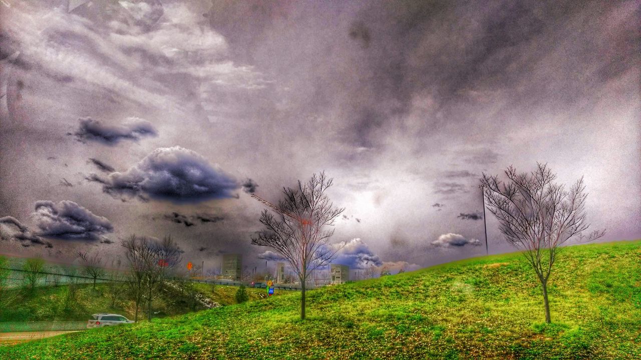 sky, cloud - sky, weather, cloudy, grass, field, landscape, nature, tree, tranquility, overcast, tranquil scene, beauty in nature, scenics, storm cloud, growth, plant, fog, grassy, outdoors