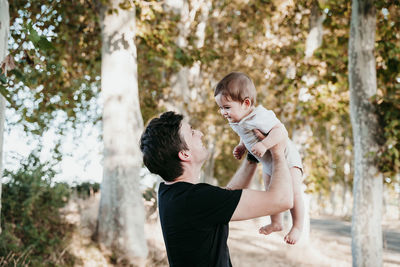 Father and son on tree