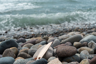 Close-up of stones on beach