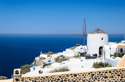 Scenic view of sea against blue sky