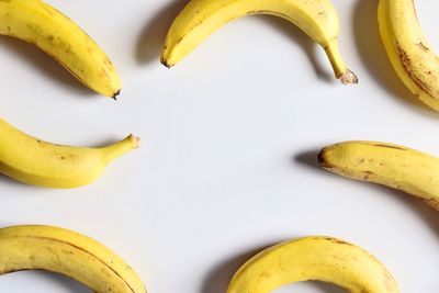 Close-up of bananas on white background