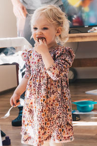 Close-up of cute girl looking at camera