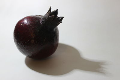 Close-up of apple on white background