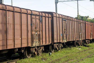 Train on railroad track against sky