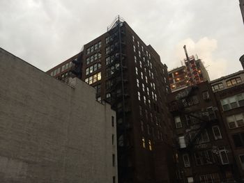 Low angle view of modern building against sky