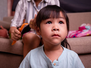 Portrait of cute girl at home