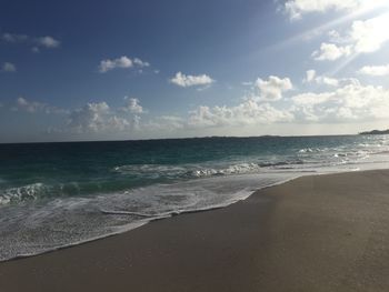 Scenic view of beach against sky