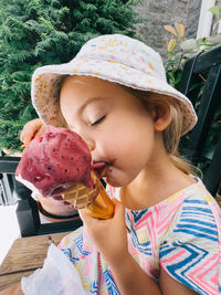 Close-up of girl eating food