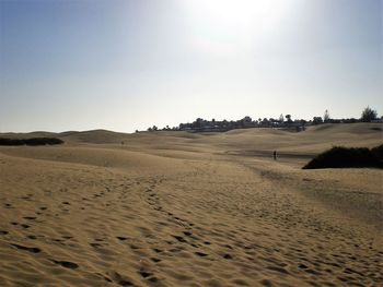 Footprints on sandy beach