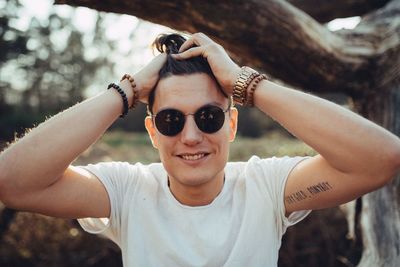 Portrait of young man wearing sunglasses