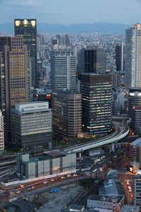 High angle view of buildings in city against sky