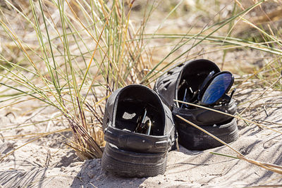 High angle view of shoes on grass