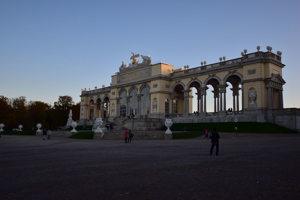 PEOPLE IN FRONT OF HISTORICAL BUILDING