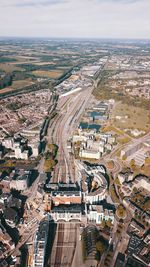 High angle view of buildings in city against sky