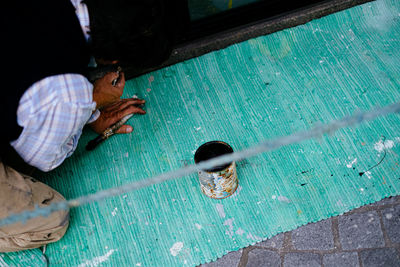 High angle view of men playing on water