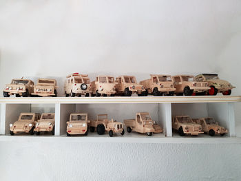 View of toys on shelf against wall