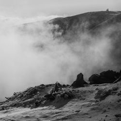 Scenic view of rocky mountains against sky