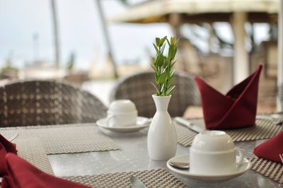 Vase on table in restaurant