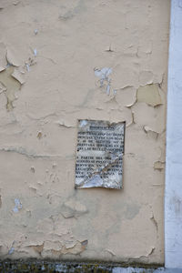 Close-up of text on wall