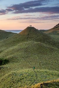 Scenic view of mountain against sky during sunset