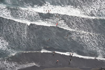 Aerial view of people on enjoying in sea