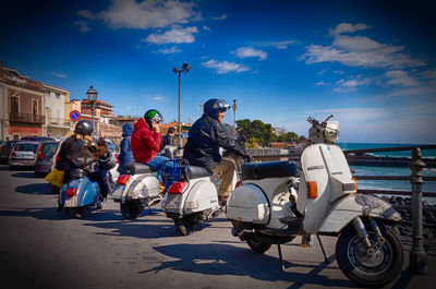 People on road against sky