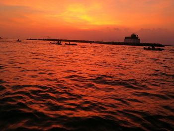 Scenic view of sea at sunset