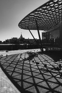 Zebra crossing on building against clear sky