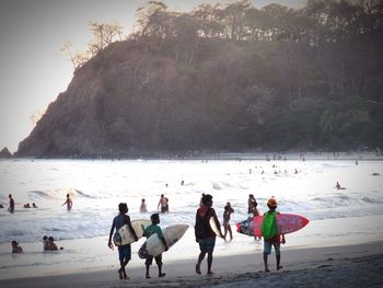 People enjoying at beach