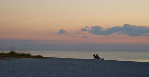 Scenic view of sea at sunset