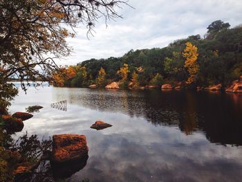 Scenic view of lake against sky during autumn