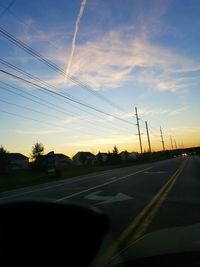 Road against sky during sunset