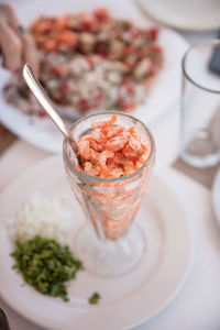 High angle view of shrimps in glass on table