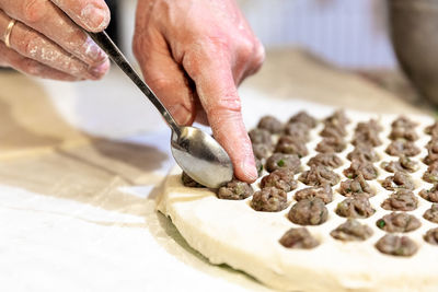 Close-up of person preparing food