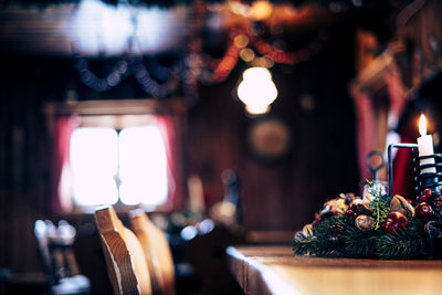 Close-up of illuminated christmas lights on table