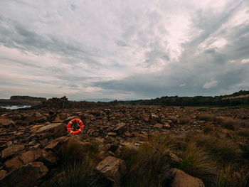 View of hot air balloon against cloudy sky