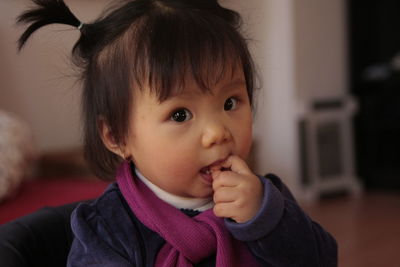 Portrait of cute baby at home