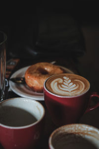 Close-up of cappuccino on table