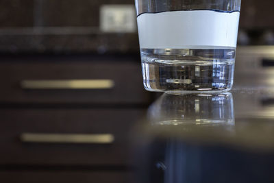 Close-up of beer glass on table