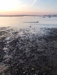 Scenic view of sea against sky at sunset