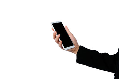 Low angle view of person using smart phone against white background