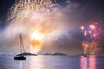 Firework display at night