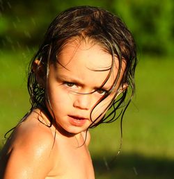 Close-up portrait of shirtless girl