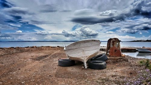 Scenic view of sea against cloudy sky