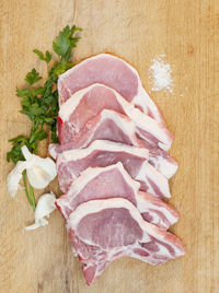 Meat on wooden background