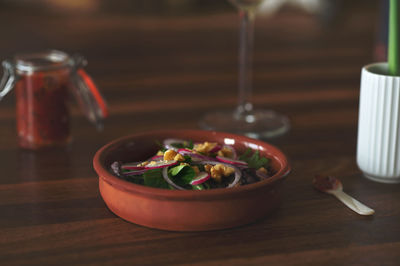Close-up of salad in bowl on table