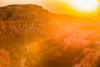 Scenic view of landscape against sky during sunset