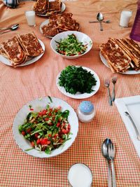 High angle view of breakfast served on table