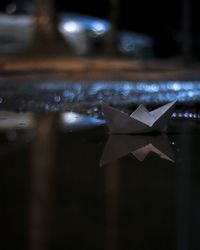 Close-up of paper floating on water
