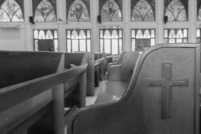 Close-up of pews in church